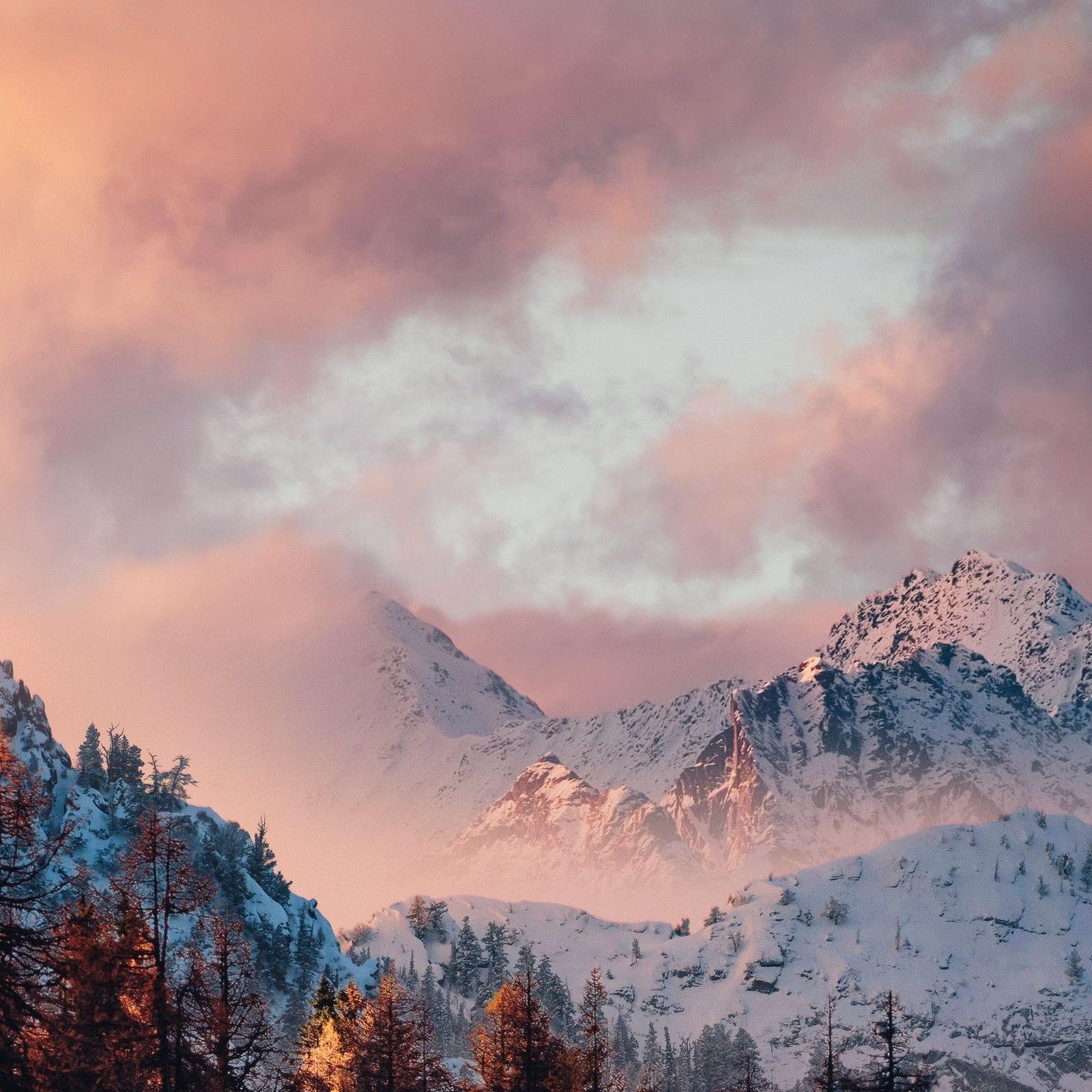 Download Pink Sunset Over Snowy Mountains 2K iPhone