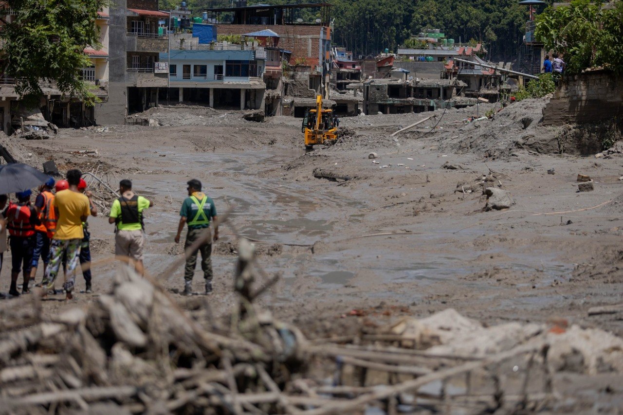 Nepal Buries Unclaimed Flood Victims Amid Health Concerns
