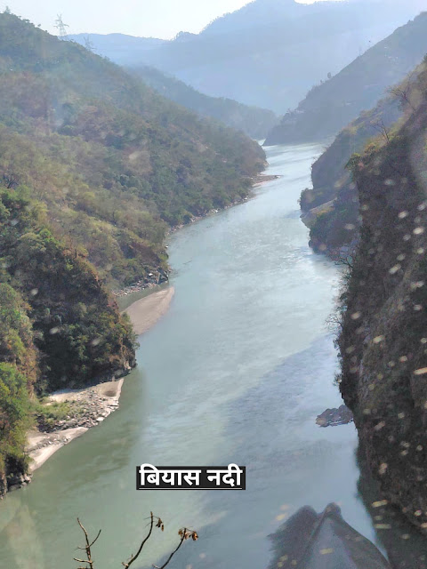 अ