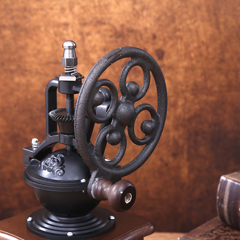 Manual coffee grinder with CNC grinding mechanism and brush