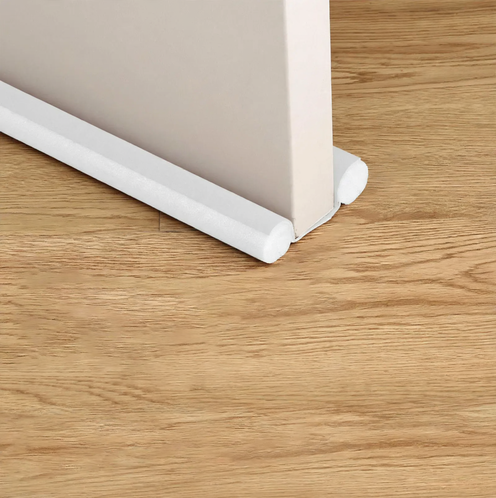 Door bottom seal for sound and draft protection