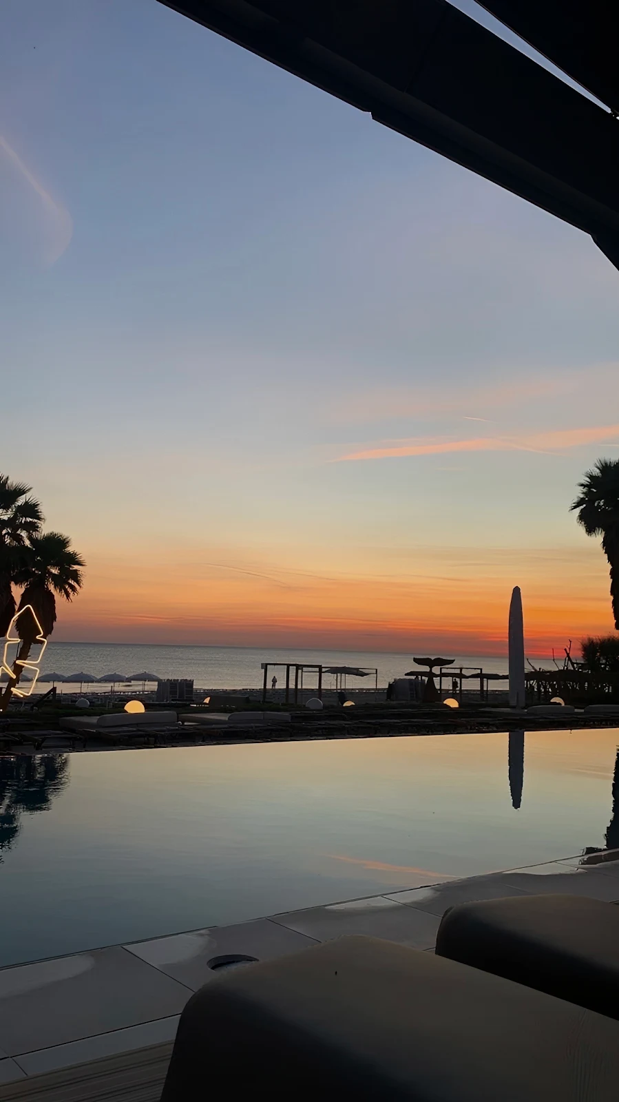 Ocean Resort Pool at Sunset - Travel Photography Full HD iPhone Wallpaper (1286x2288)