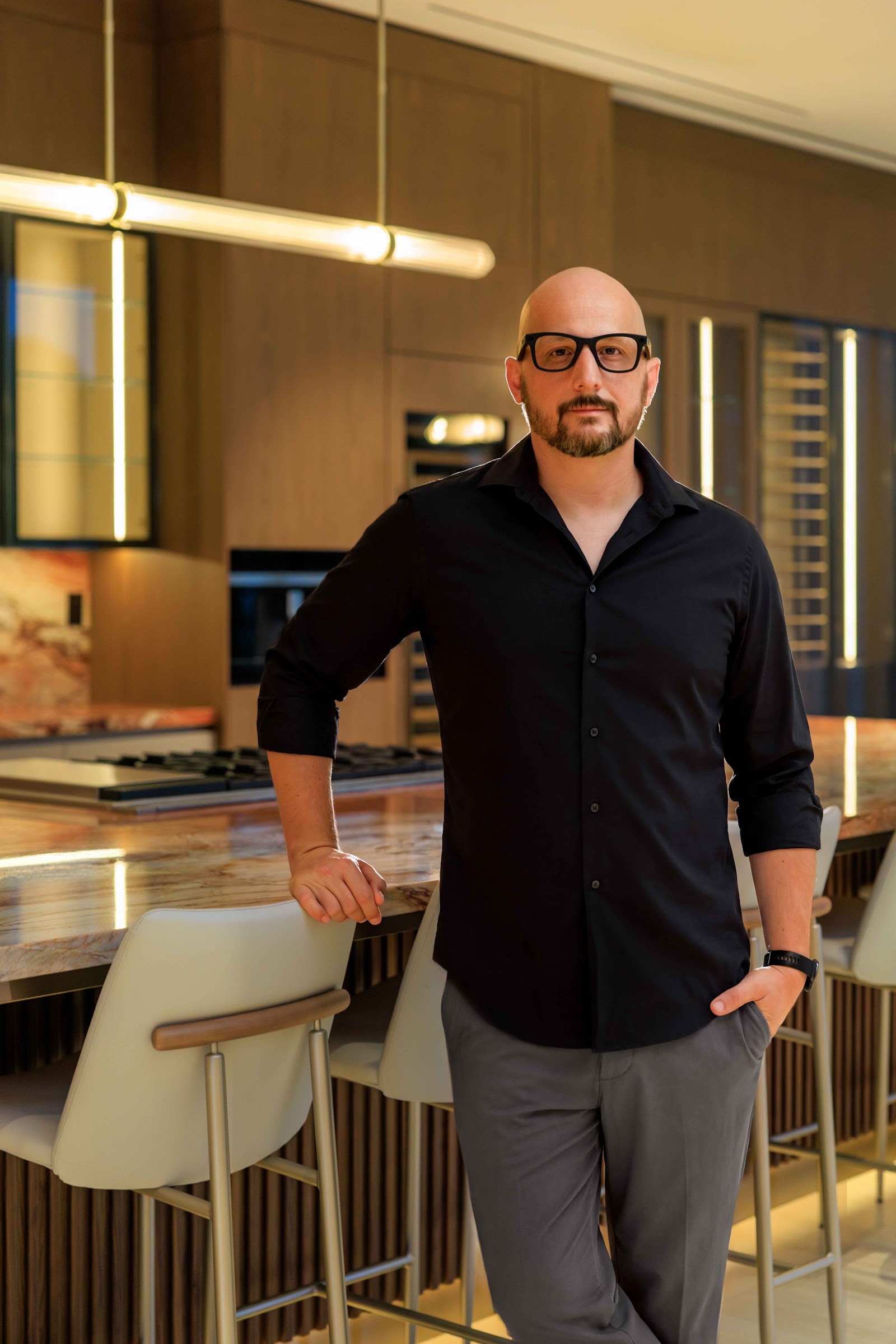 Robert, Founder and CEO of Retake Creative Studio, in a luxury residential kitchen
