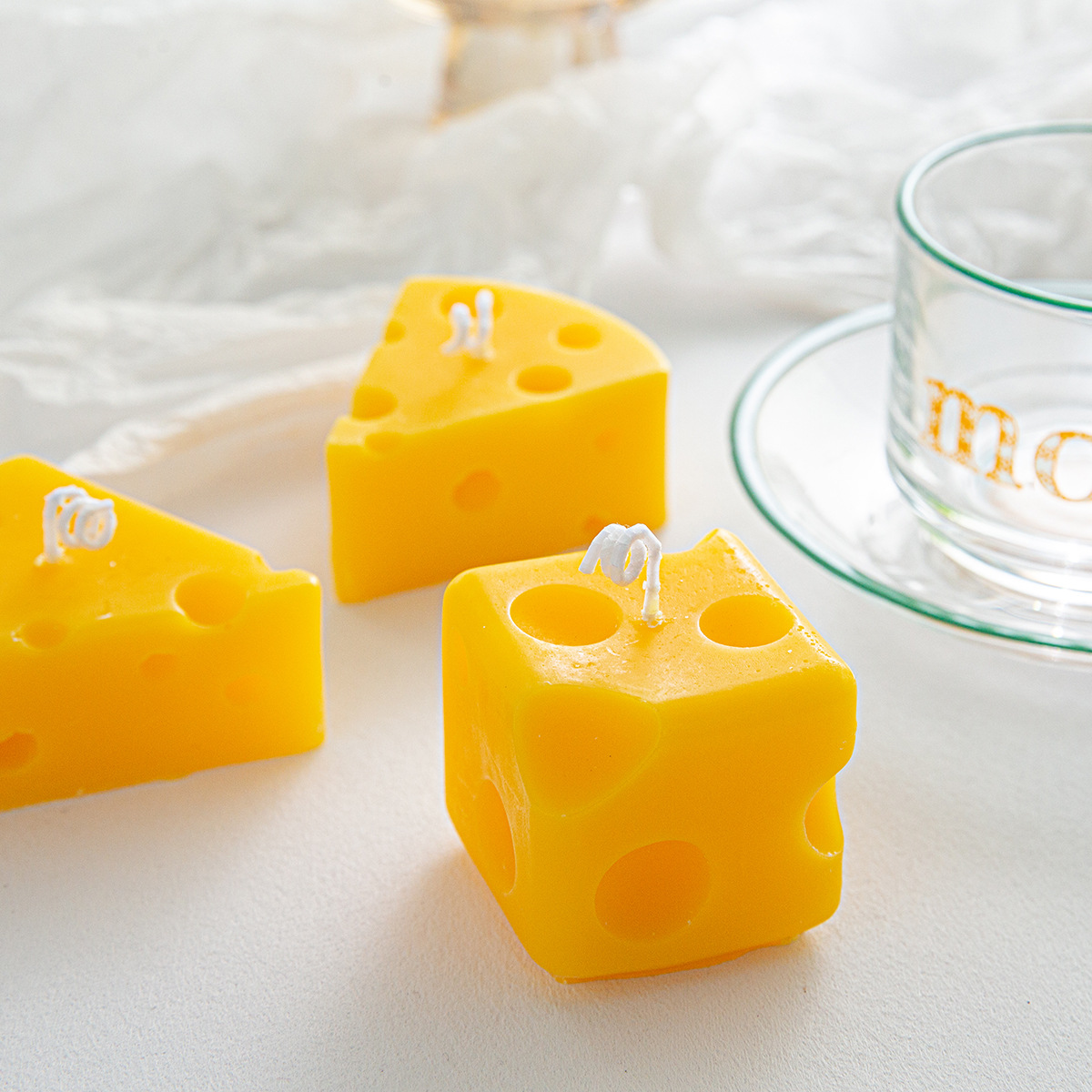 Fragrant candle in cheese shape made of soy wax