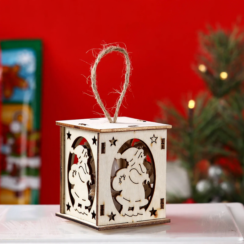 Illuminated wooden house for Christmas
