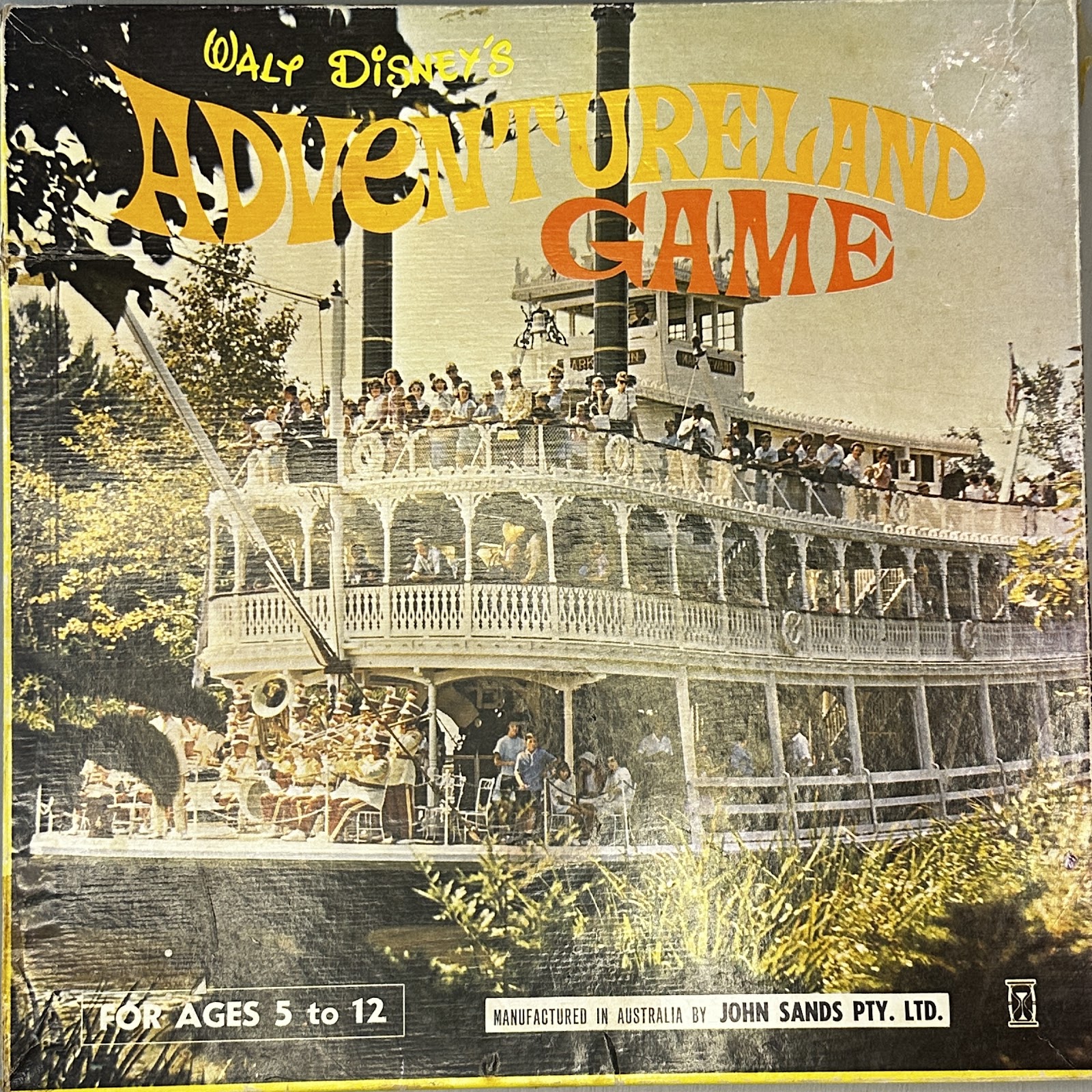 Walt Disney's Adventureland Game published by John Sands Pty. Ltd. in Australia, with cover photograph of the Disneyland Mark Twain Riverboat and the Disneyland Band