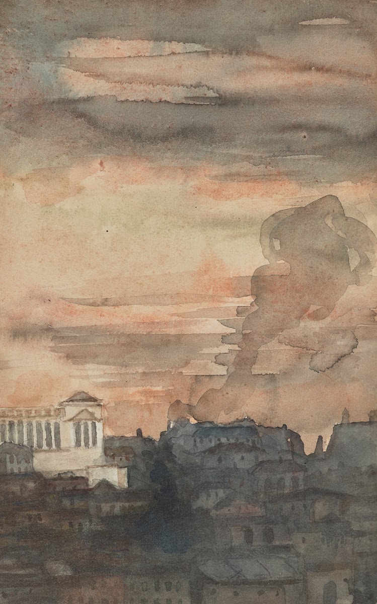 View of Rome with the Vittorio Emanuele II Monument in the distance at sunset