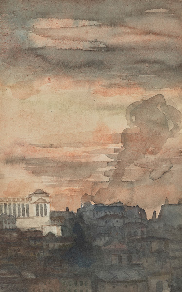 View of Rome with the Vittorio Emanuele II Monument in the distance at sunset