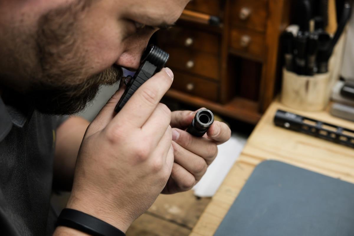 AR-15 muzzle device installation checks for thread fit and alignment