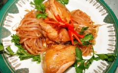 Cho ra đĩa, trang trí ngò rí và ớt, dùng nóng với cơm.