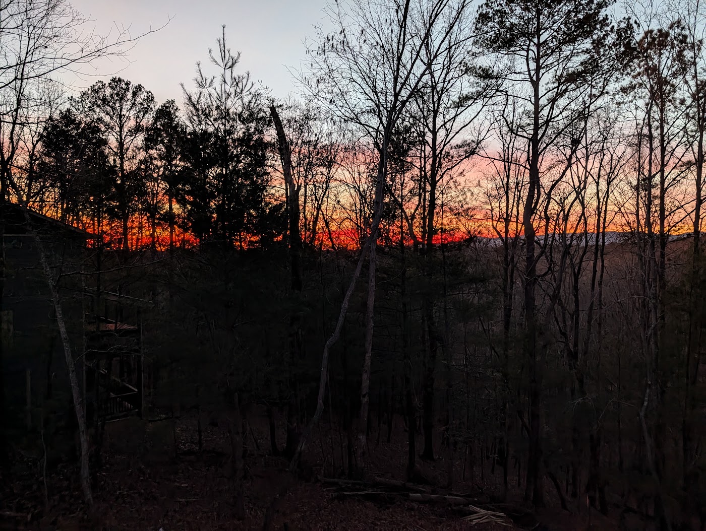 Back deck at sunset at Orchard & Vine Mountain Haus — book your summer cabin in Ellijay, Georgia