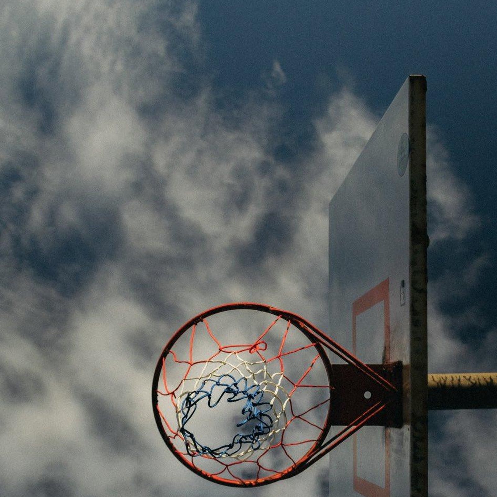 Download Outdoor Basketball Hoop Under Sky iPhone