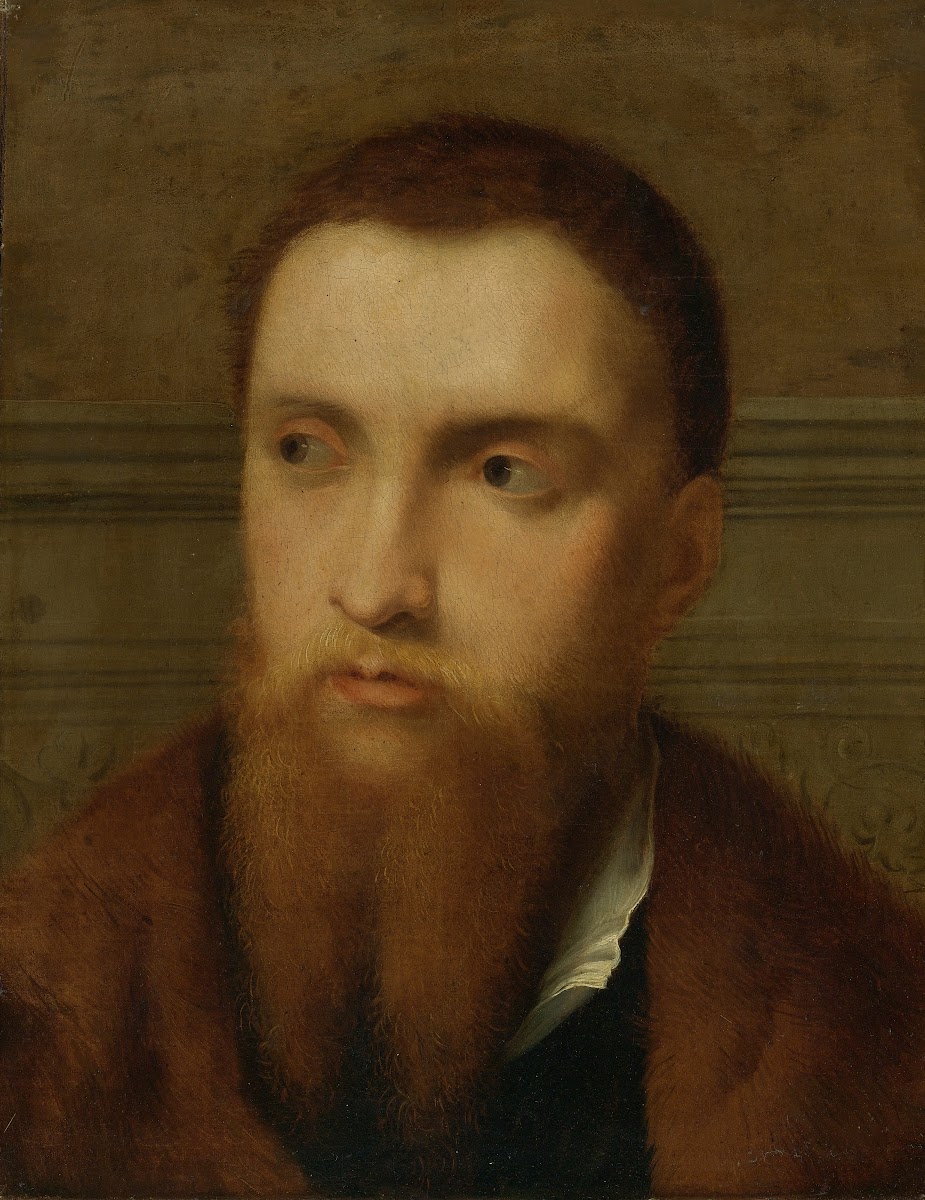 Portrait Of A Bearded Man Head And Shoulders In An Interior