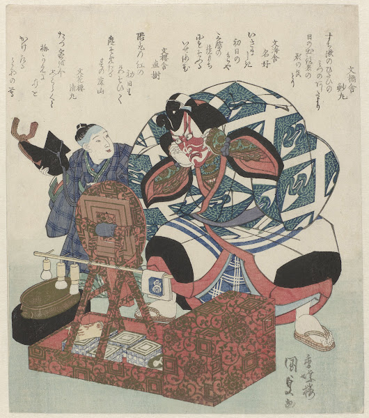 Actor Ichikawa Danjuro VII prepares for a Shibaraku performance assisted by a bo