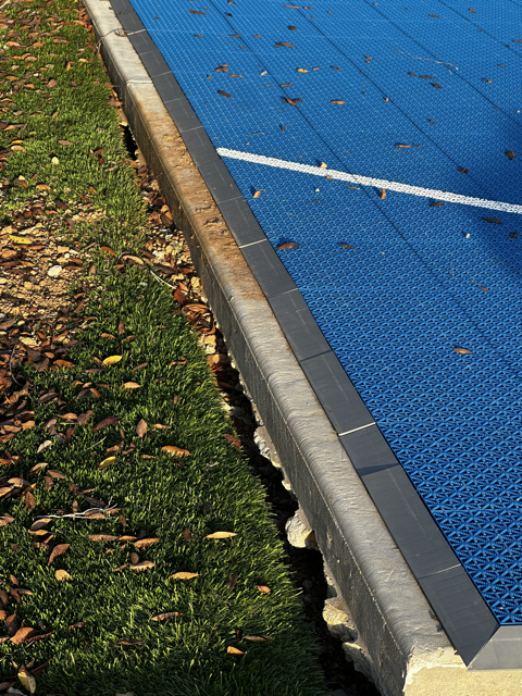 Incomplete landscape work at alleged completion