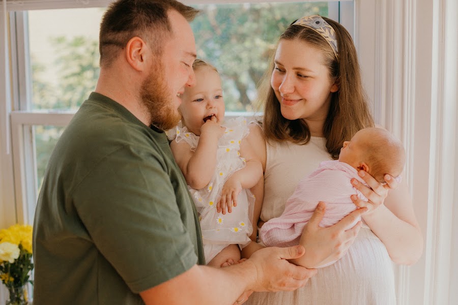 Family portrait by the window with newborn and toddler — Connecticut family photographer