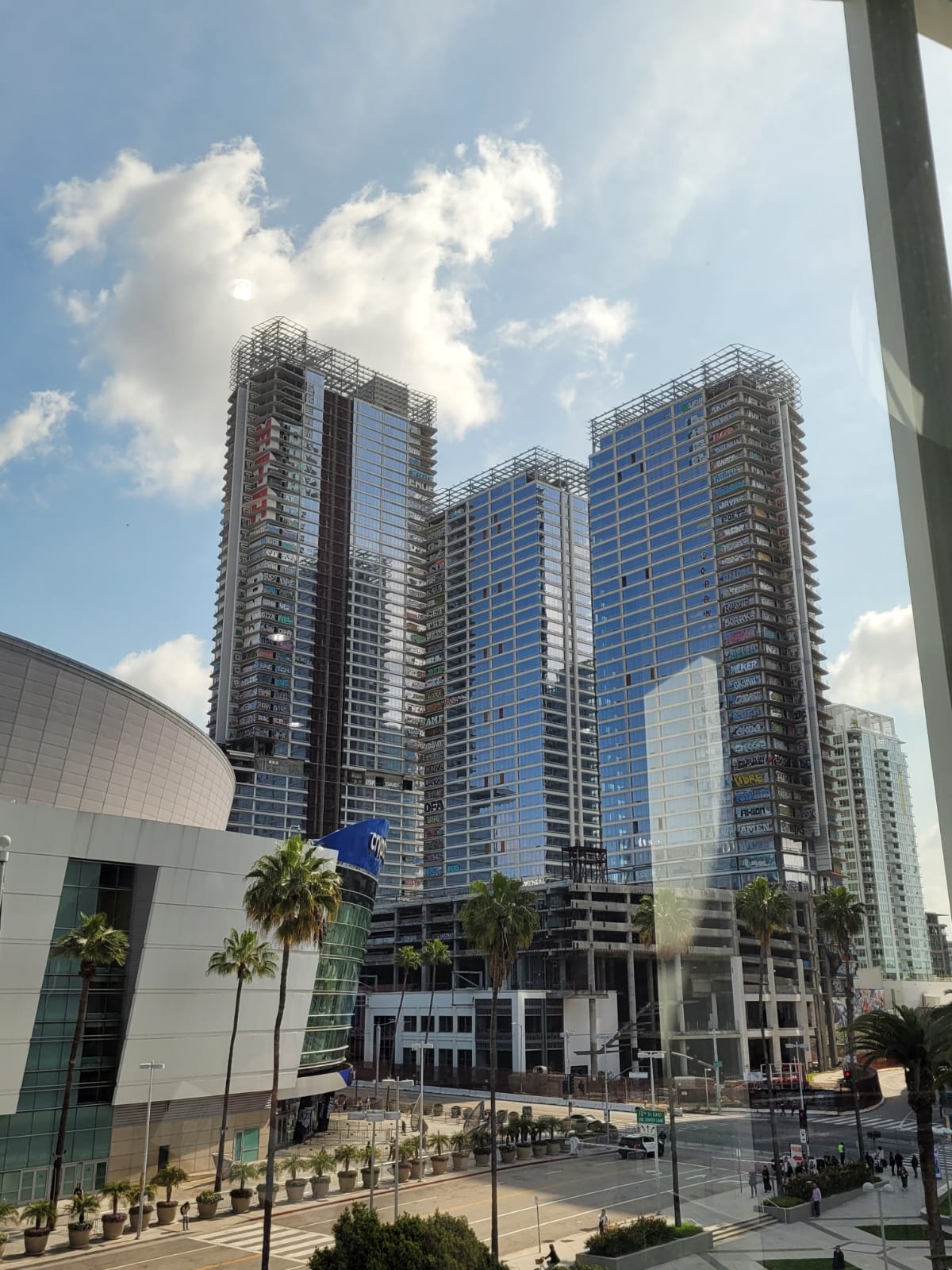 Image of an abandoned skyscraper with graffiti on the side