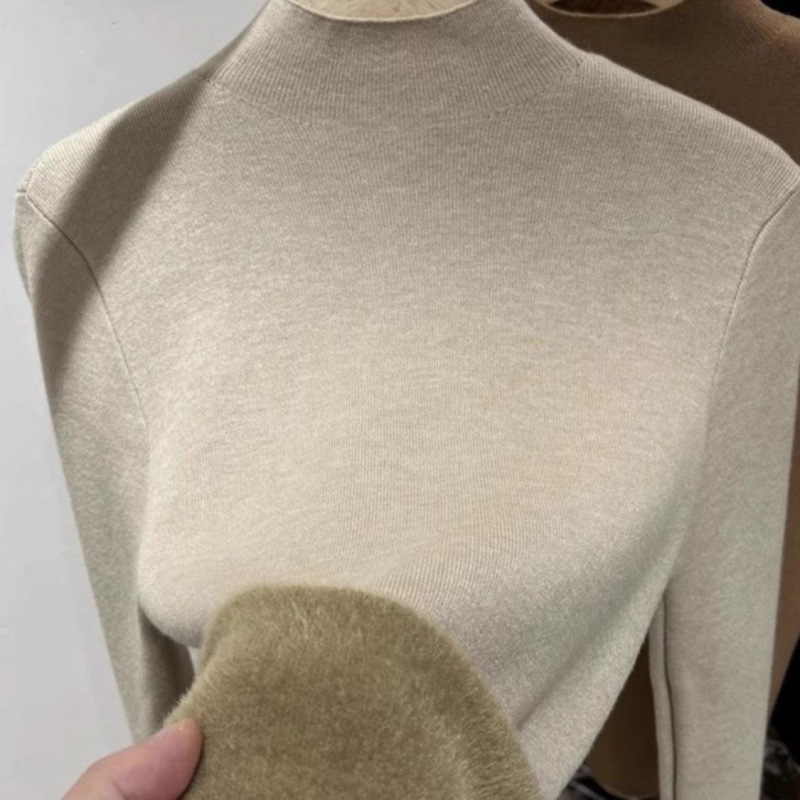 Women's knitted sweater with standing collar and fleece lining