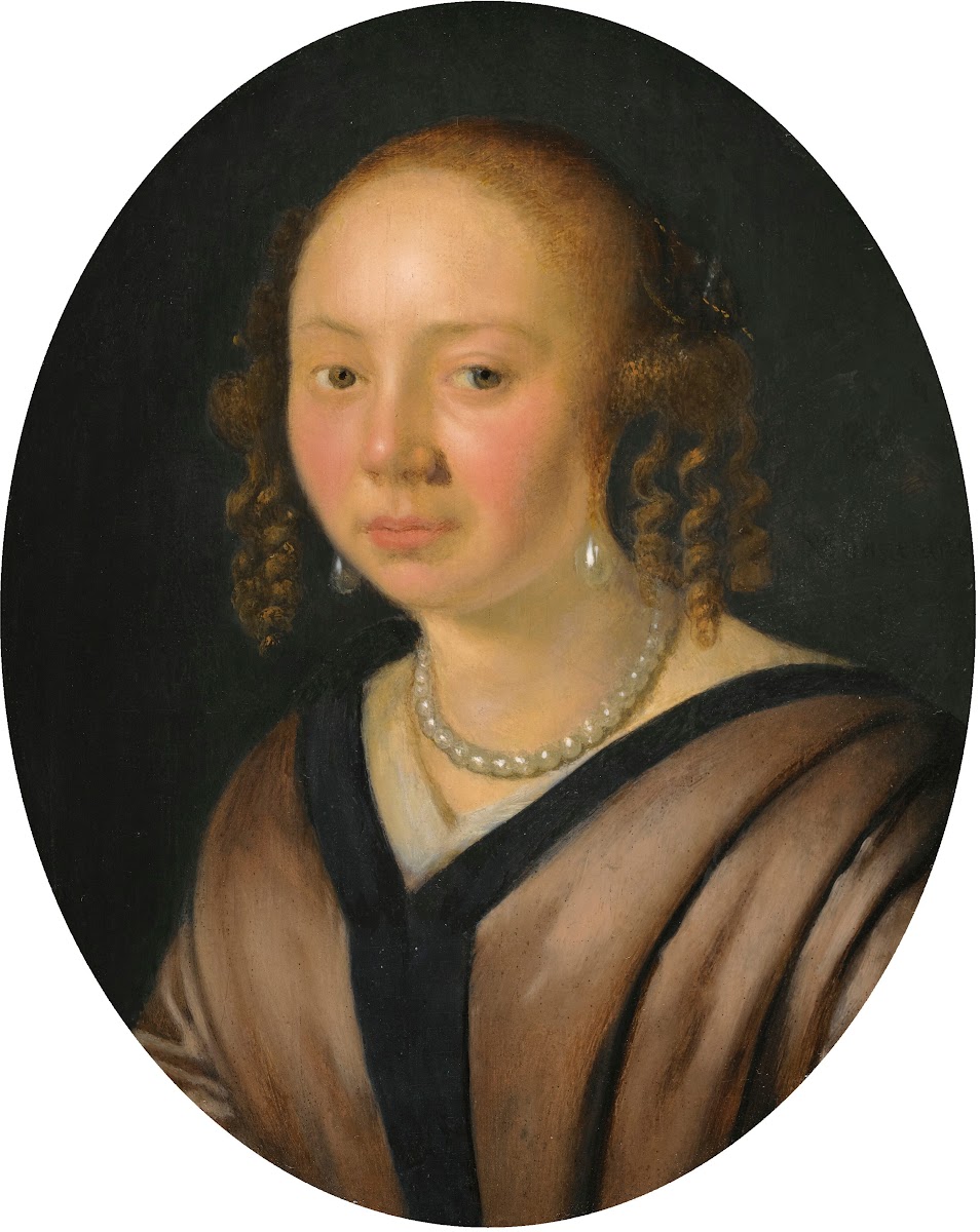 Portrait Of A Lady Head And Shoulders Wearing Pearl Earrings And A Necklace