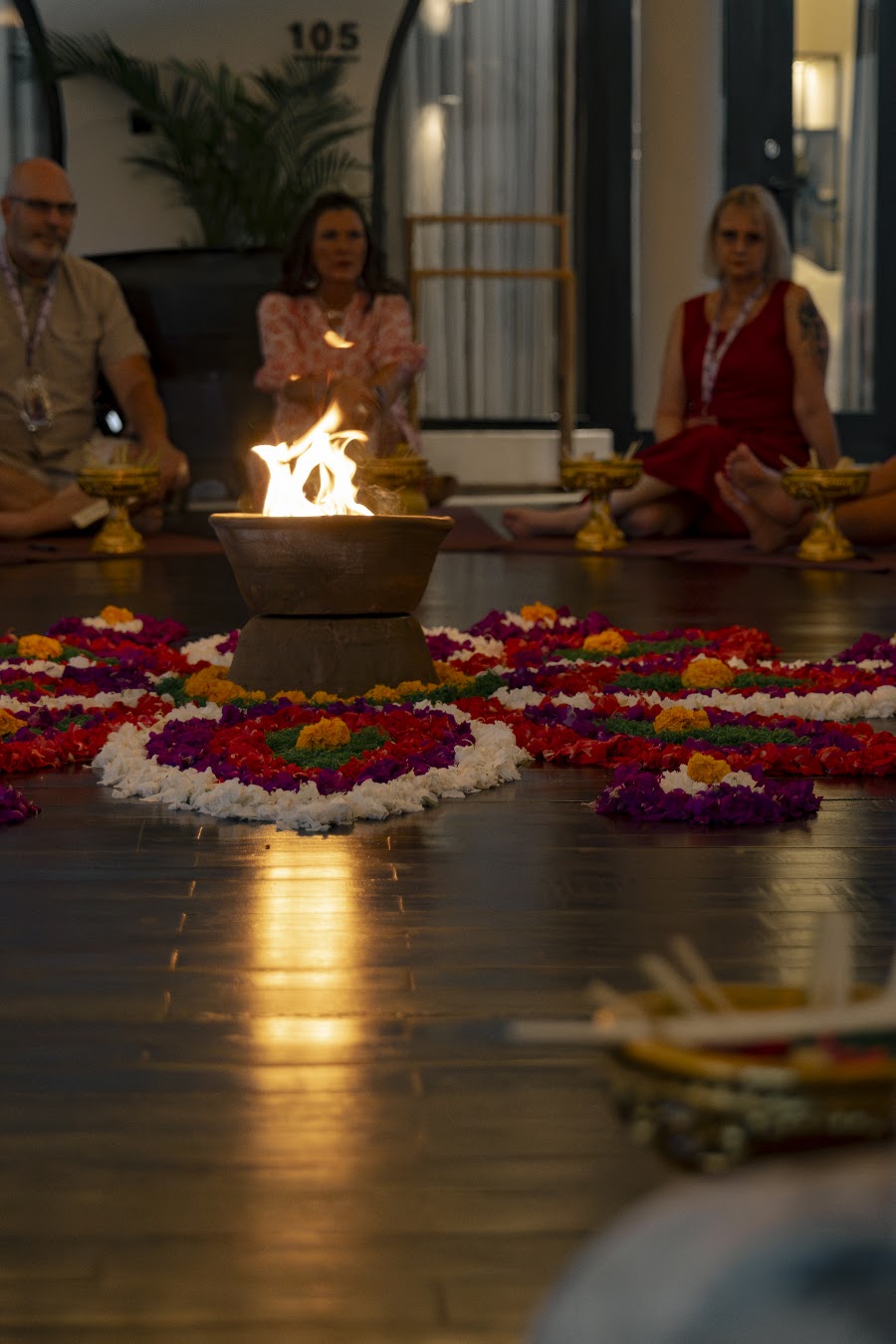 Fire bowl and flower mandala ceremony by night at Soulshine Bali