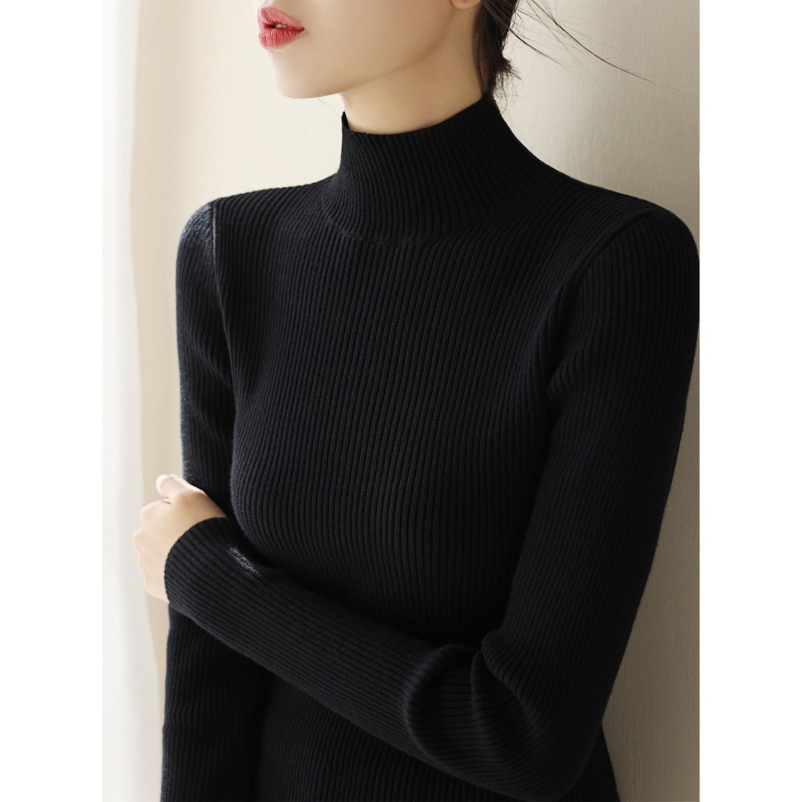 Women's knitted wool sweater with a half-stand collar