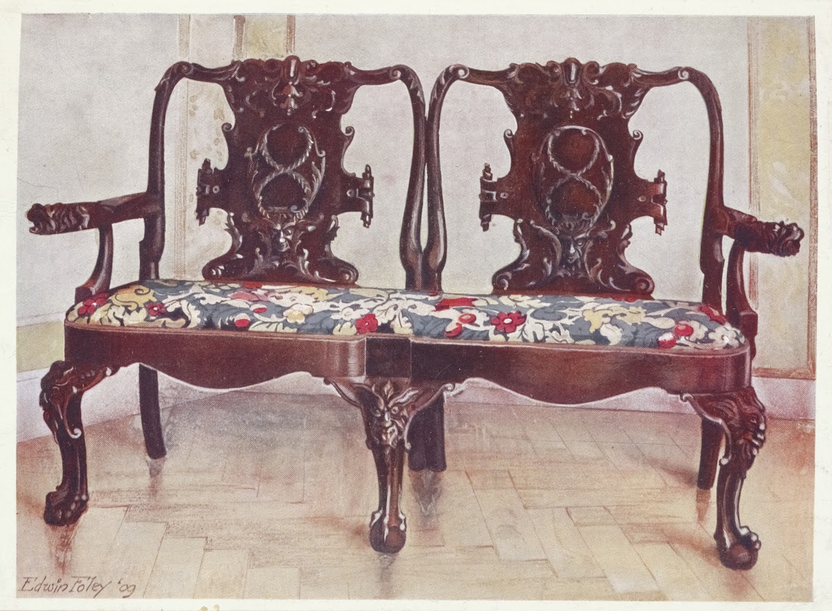 Carved walnut darby and Joan settee 1910   1911