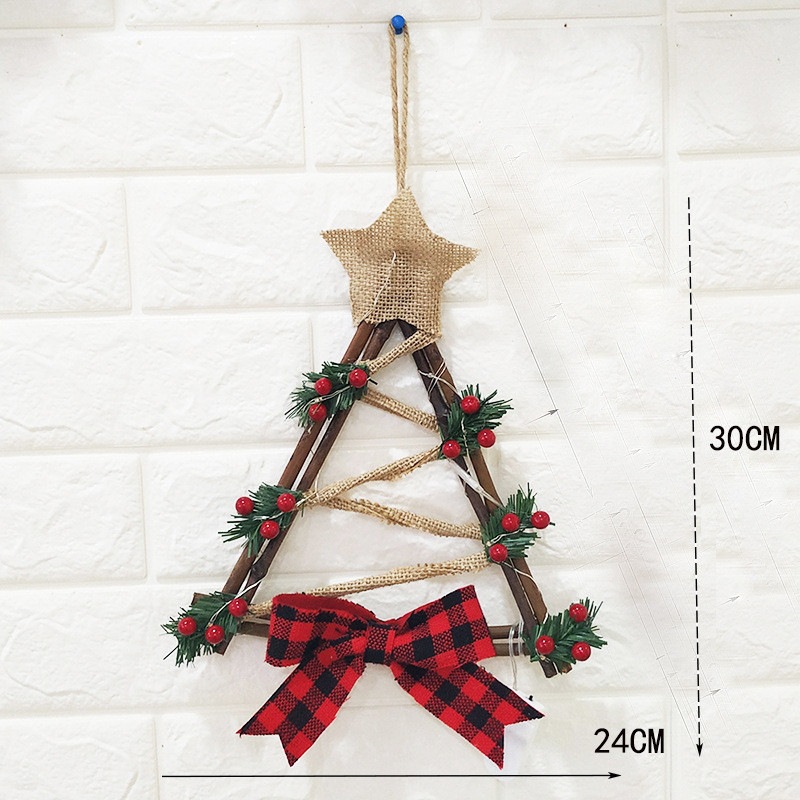Decorative Christmas wreath made of textiles and natural materials