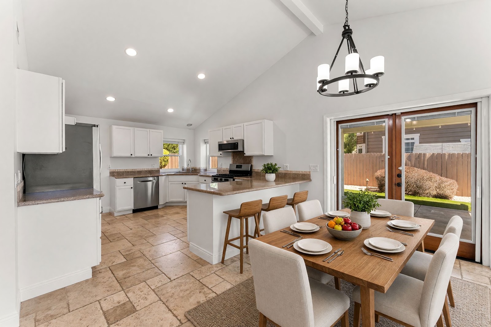 Kitchen with granite counters and dining area