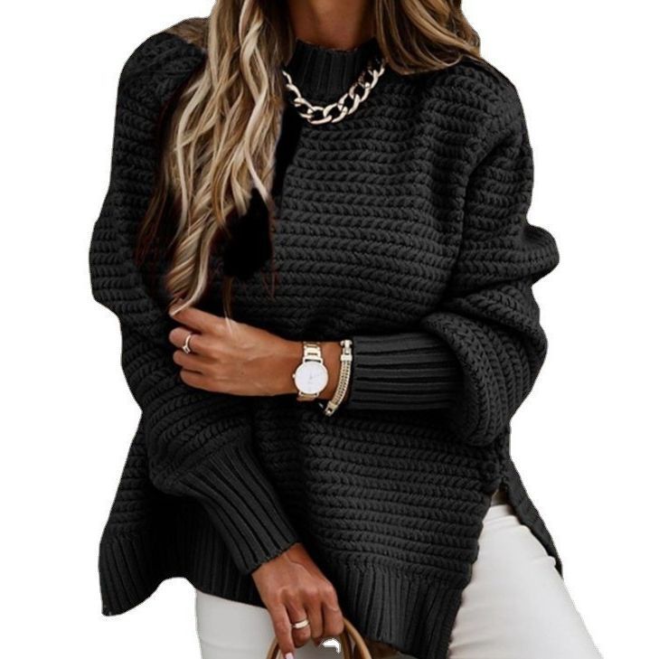 Loose women's knit sweater with cable pattern