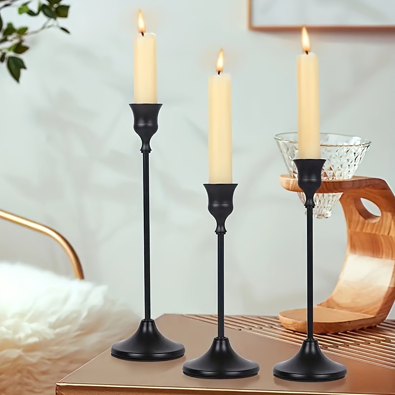 Decorative metal candle holder in bell design