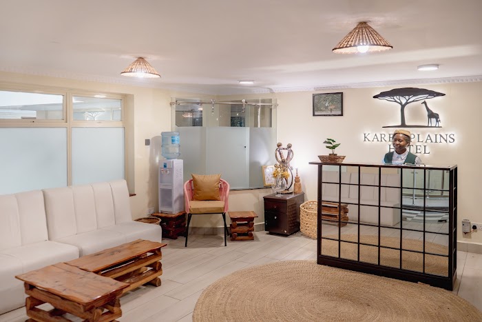 Front desk check-in area Karen Plains Hotel