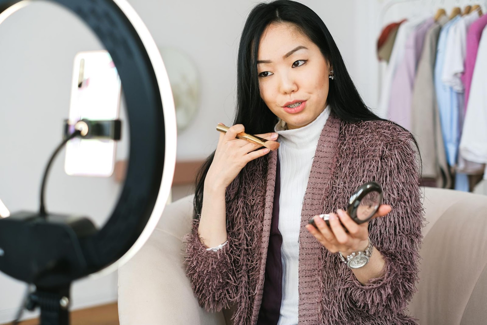 An influencer presenting products during a live stream, demonstrating the interactive nature of social commerce.