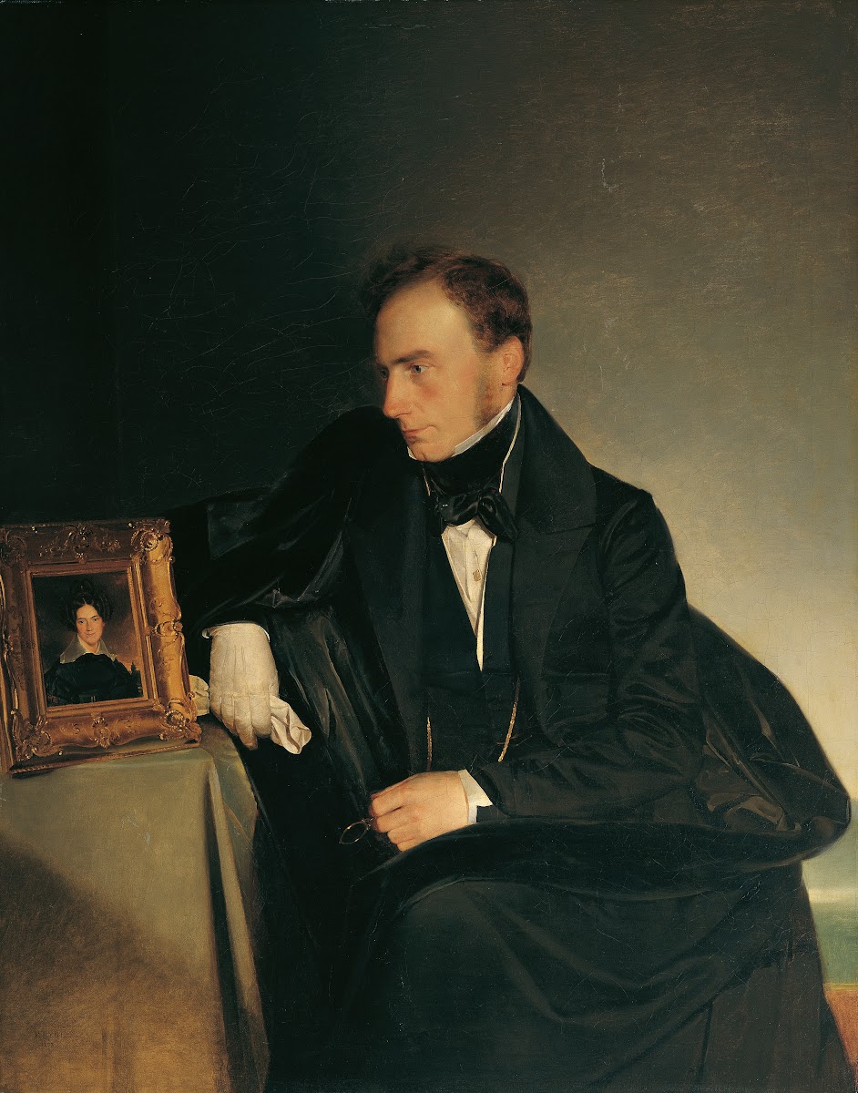 The painter Franz Wipplinger looking at the miniature portrait of his deceased s