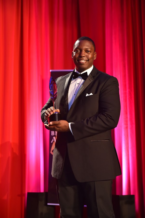 Andrew Lamb accepting an award