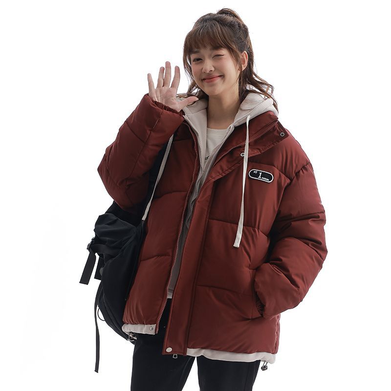 Padded women's winter jacket in layered look