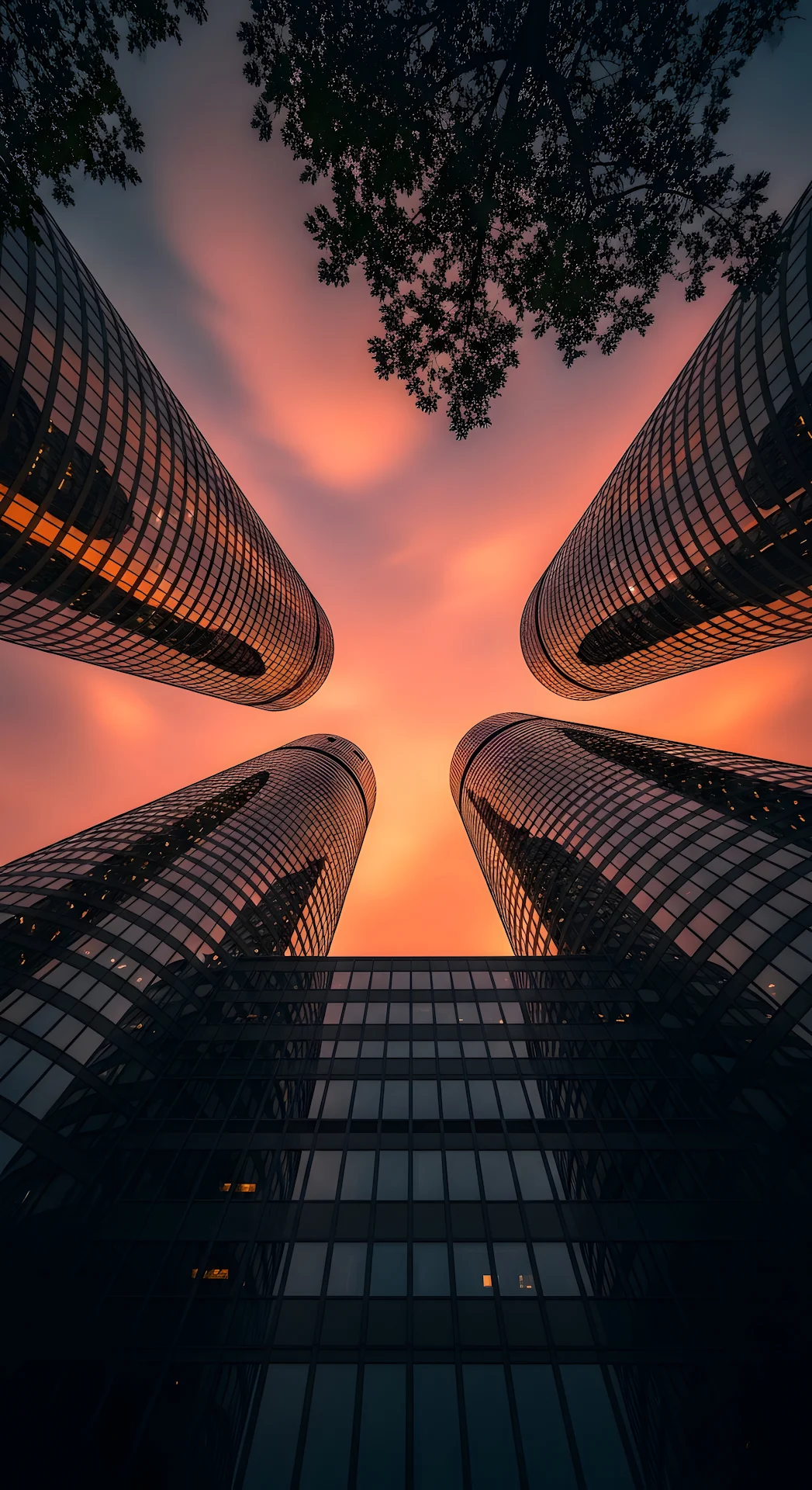 Dramatic Worm's Eye View of Modern City Skyscrapers at Sunset - Free 4K mobile Wallpaper