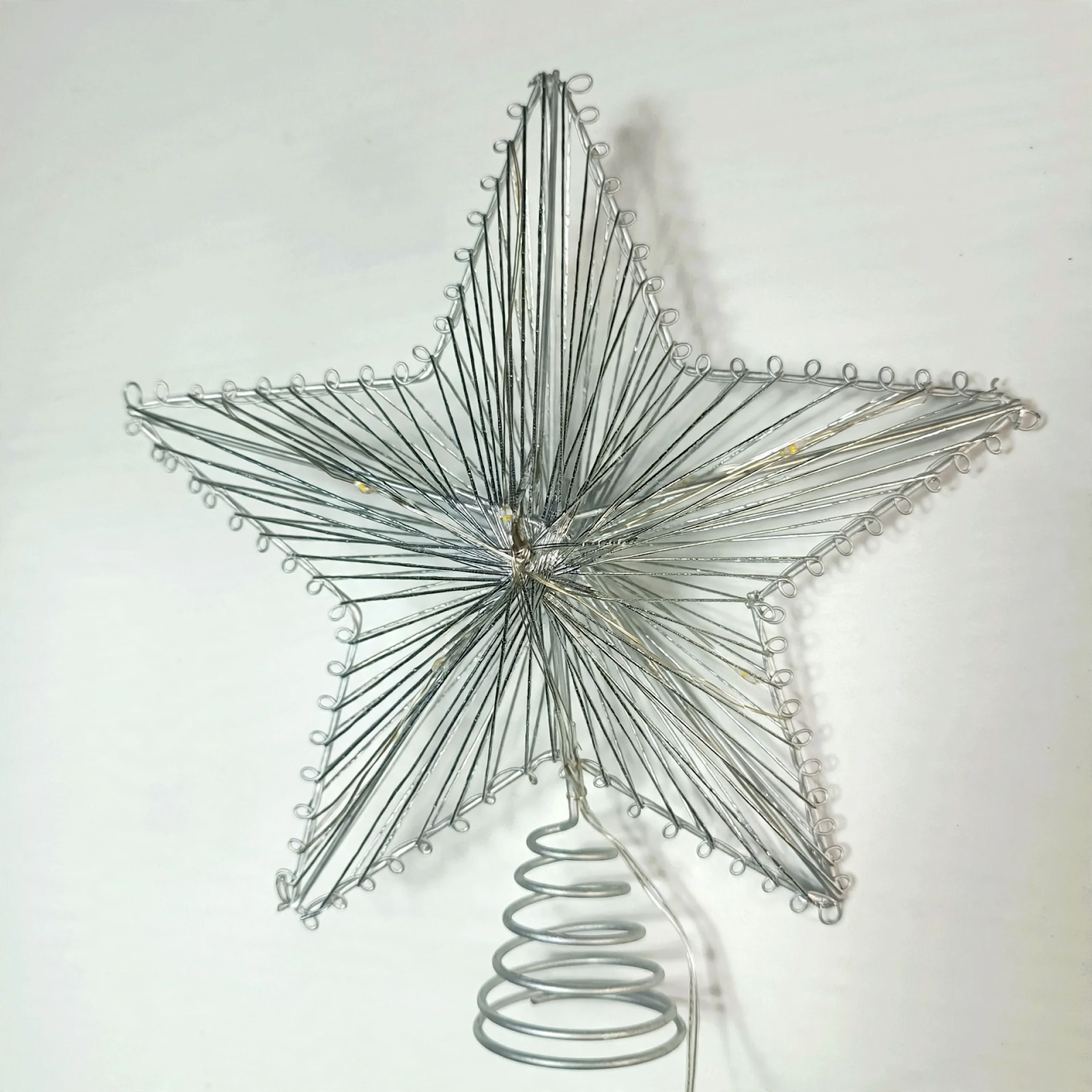 Illuminated Christmas tree star made of iron