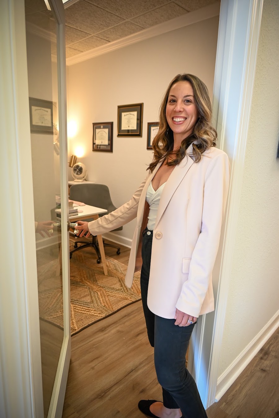 Inside the Nutrition Thyme office — framed dietitian credentials on the wall of the consultation room
