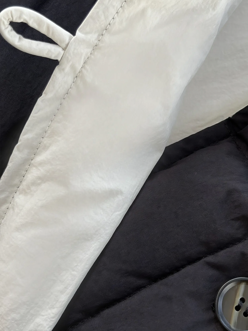 Wendbare Daunenjacke mit Stehkragen