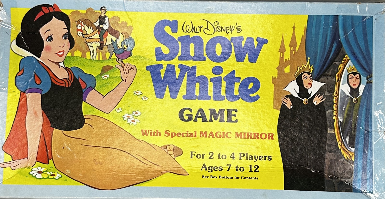 Box art for Walt Disney's Snow White Game With Special Magic Mirror, showing Snow White with a bluebird, the Prince on horseback, and the Evil Queen at the Magic Mirror.