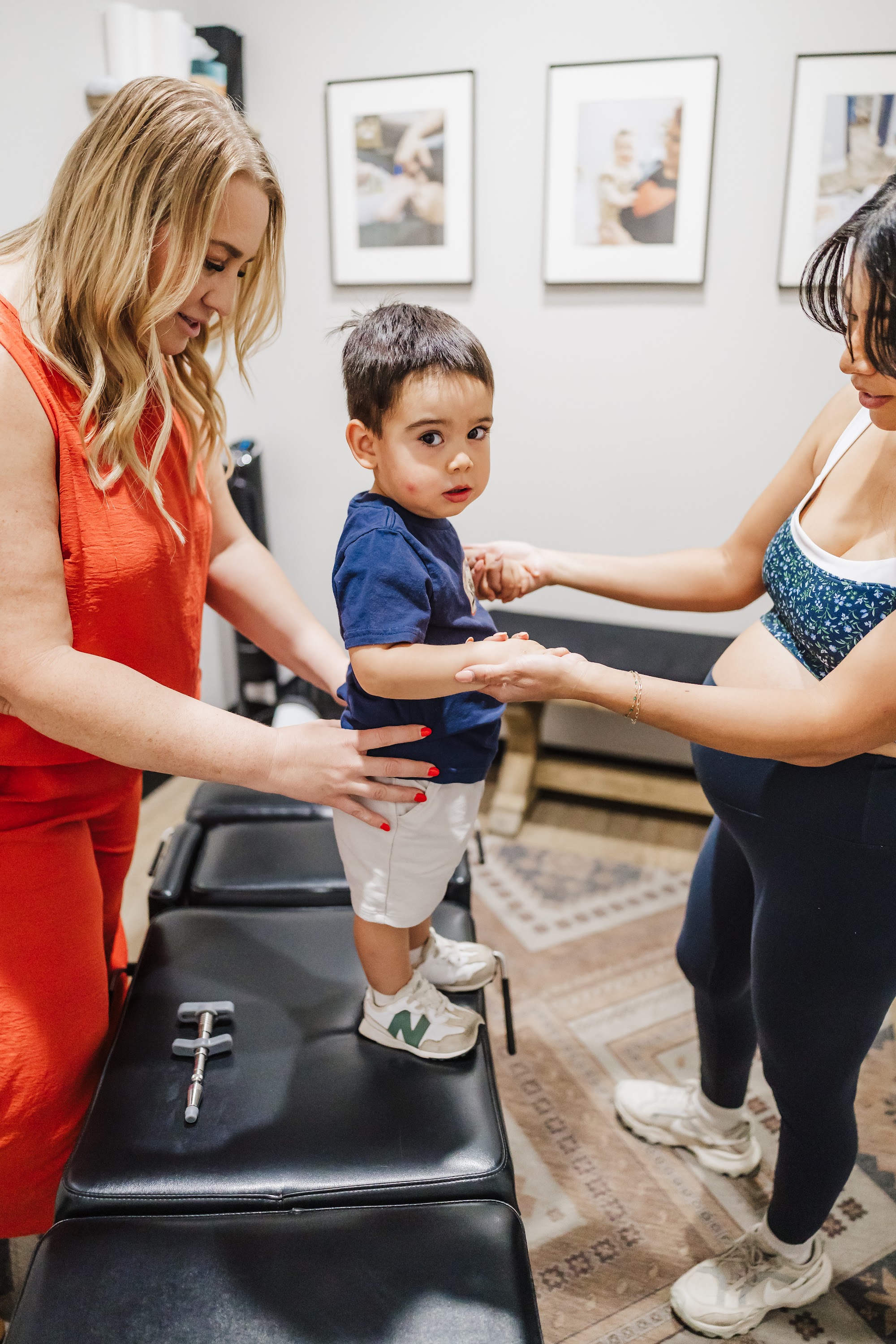 A toddler being adjusted at Ignite Family Chiropractic