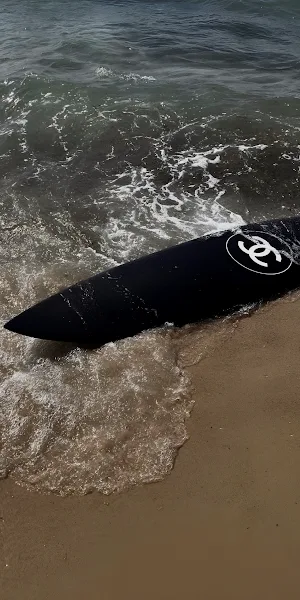 Chanel Surfboard On The Beach Full HD iPhone Wallpaper Background