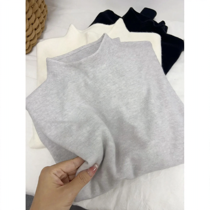 Women's knitted sweater with stand-up collar, solid color