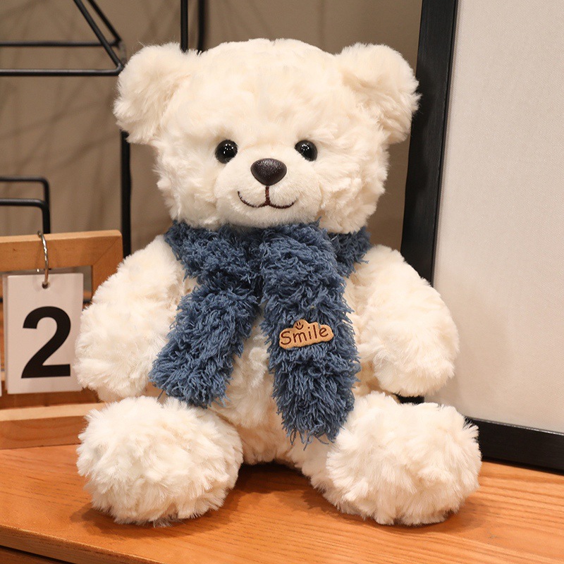 Großer Plüsch-Teddybär mit Seidenschleife