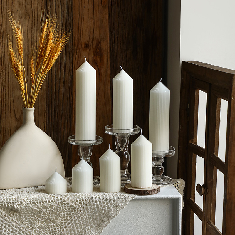 White spire candle with stripe pattern, Nordic