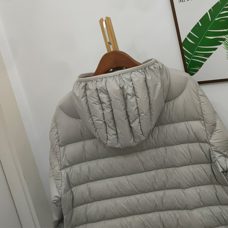 Light ladies down jacket with hood, quilted