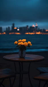Yellow Roses on Table Over Dark City Skyline View