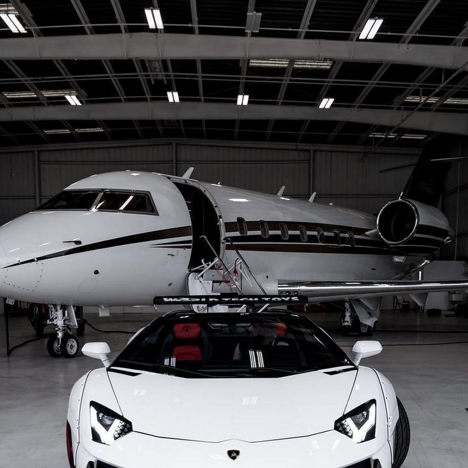 Download White Lamborghini Aventador in Hangar iPhone