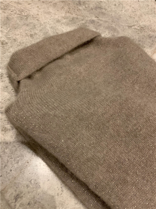 Women's wool sweater with stand-up collar and shine effect