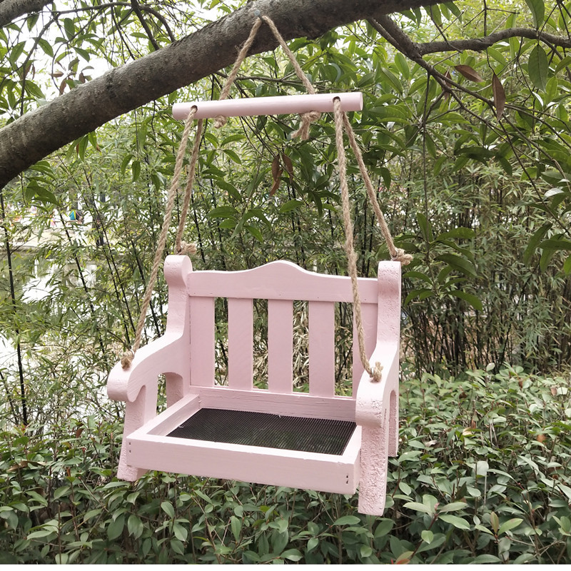 Automatic birdhouse made of pine wood to hang